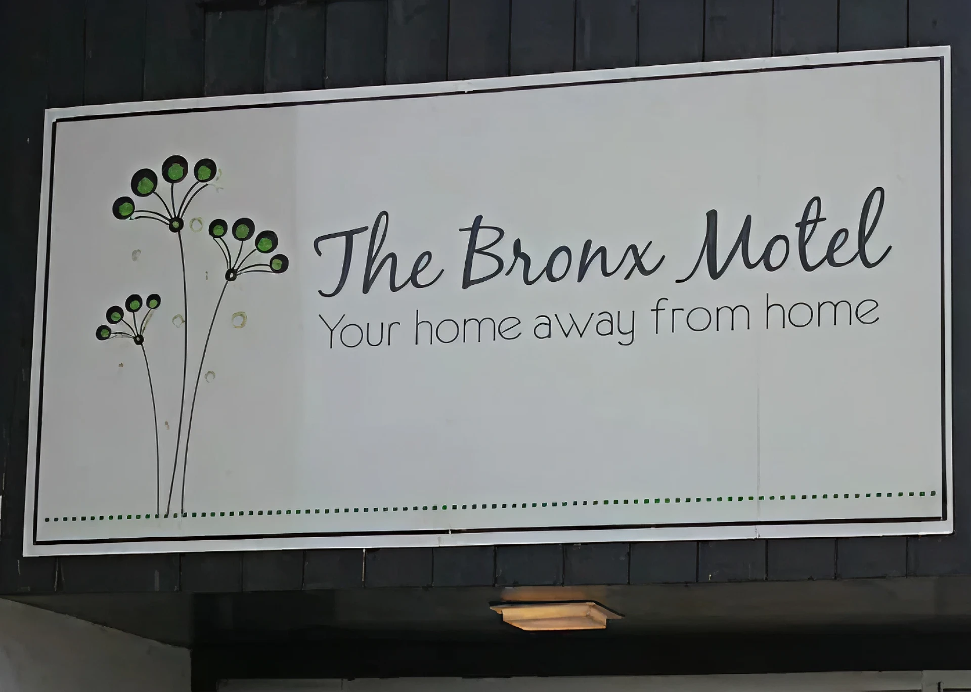 Motel sign with decorative design